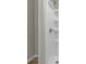 Close up of a crisp white shower with a silver shower head and faucet at 418 Harlan St, Indianapolis, IN 46201