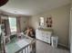 Neutral Bedroom features a crib and dresser with a changing table plus decor accents at 5117 Bahia Dr, Indianapolis, IN 46237