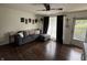 Bright living room featuring wood floors, neutral walls, and comfortable seating at 5117 Bahia Dr, Indianapolis, IN 46237