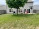 Backyard with patio, grill, and basketball hoop at 5241 Waterton Lakes Dr, Indianapolis, IN 46237