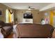 Inviting living room featuring stylish furnishings, hardwood floors, and a ceiling fan at 5241 Waterton Lakes Dr, Indianapolis, IN 46237