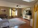 Cozy living room with hardwood floors, plush rug, and elegant decor at 5241 Waterton Lakes Dr, Indianapolis, IN 46237