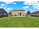Backyard features a big yard, fence and mature tree at 5517 Jona Way, Bargersville, IN 46106