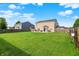 Large backyard with ample lawn and fencing at 5517 Jona Way, Bargersville, IN 46106