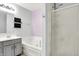 This bathroom boasts a double vanity, soaking tub, and glass door shower at 5517 Jona Way, Bargersville, IN 46106