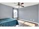 Second bedroom features a ceiling fan and hardwood floors at 5517 Jona Way, Bargersville, IN 46106