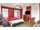 Bedroom features wood floors, ceiling fan and a large screen tv at 5517 Jona Way, Bargersville, IN 46106