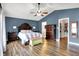 This primary bedroom boasts hardwood floors and ensuite access at 5517 Jona Way, Bargersville, IN 46106