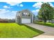 Attractive home boasting well-kept landscaping, a driveway, and a lush green lawn at 5517 Jona Way, Bargersville, IN 46106