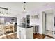 Open kitchen design blends kitchen island with dining area and living space in the background at 5517 Jona Way, Bargersville, IN 46106