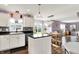 Modern kitchen seamlessly connects with dining area, and offers backyard views at 5517 Jona Way, Bargersville, IN 46106
