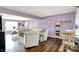 Cozy living room featuring hardwood floors, an open layout, and soft lighting at 5517 Jona Way, Bargersville, IN 46106