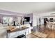 Inviting living room boasts hardwood floors and transitions into a stylish kitchen area at 5517 Jona Way, Bargersville, IN 46106