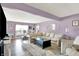 Spacious living room with hardwood floors, lots of natural light, and a stylish decor at 5517 Jona Way, Bargersville, IN 46106