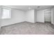 This bedroom features soft carpet, white trim, and a closet at 5809 N Illinois St, Indianapolis, IN 46208