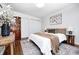 This beautifully designed bedroom features two closets, natural light, and hardwood floors at 5809 N Illinois St, Indianapolis, IN 46208