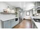 Updated kitchen featuring modern appliances, ample counter space, and custom cabinetry at 5809 N Illinois St, Indianapolis, IN 46208