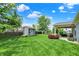 Large backyard with a storage shed, and covered outdoor patio at 5850 Lyster Ln, Indianapolis, IN 46239