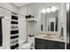 Neutral toned bathroom features a shower and tub combo, vanity, and medicine cabinet with ample storage at 5850 Lyster Ln, Indianapolis, IN 46239
