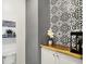 Charming bathroom features patterned tile, wood counter, and decor at 5850 Lyster Ln, Indianapolis, IN 46239