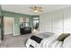 This bedroom features a wall trim design and calming green colored walls at 5850 Lyster Ln, Indianapolis, IN 46239