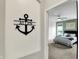 View into the bedroom featuring calming paint and decor with carpeted floors at 5850 Lyster Ln, Indianapolis, IN 46239