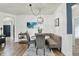 Cozy dining area with banquette seating, stylish lighting, and tasteful decor for intimate meals at 5850 Lyster Ln, Indianapolis, IN 46239