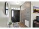 Elegant foyer featuring a modern design, ample natural light, and refined decor at 5850 Lyster Ln, Indianapolis, IN 46239