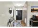 Bright foyer showcasing stylish accents, a sleek console table, and a welcoming atmosphere at 5850 Lyster Ln, Indianapolis, IN 46239