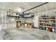 Spacious garage featuring organized shelving and storage solutions for tools and equipment at 5850 Lyster Ln, Indianapolis, IN 46239