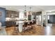 Gourmet kitchen boasts a spacious island, stainless steel appliances, and sleek cabinetry for modern cooking at 5850 Lyster Ln, Indianapolis, IN 46239