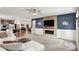 Inviting living room highlighting open floorplan, fireplace feature, and comfortable seating at 5850 Lyster Ln, Indianapolis, IN 46239