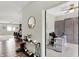 Versatile home office showcasing built-in storage and views into adjacent living spaces at 5850 Lyster Ln, Indianapolis, IN 46239