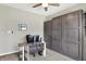 Well-appointed home office showcasing built-in shelving and an efficient layout at 5850 Lyster Ln, Indianapolis, IN 46239