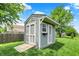 Storage shed with double doors and a ramp for easy access at 5850 Lyster Ln, Indianapolis, IN 46239