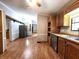 Efficient kitchen with wood cabinets, stainless steel appliances, and space for dining at 6538 N Tutterow Rd, Monrovia, IN 46157