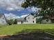 Expansive backyard with lush green lawn, ideal for outdoor activities and relaxation at 660 White Ash Trail, Mooresville, IN 46158
