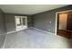 Comfortable living room with neutral carpet and plenty of natural light at 660 White Ash Trail, Mooresville, IN 46158