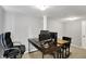 A home office with multiple desk setups and a comfortable executive chair is the perfect place to work from home at 6605 Grosvenor Pl, Indianapolis, IN 46220