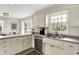 Charming kitchen with ample counter space, stainless steel appliances and lots of natural light at 6605 Grosvenor Pl, Indianapolis, IN 46220