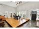 Spacious open-concept living room featuring beautiful wood floors and natural light at 6605 Grosvenor Pl, Indianapolis, IN 46220