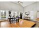 Open floor plan with views of large windows and dining room at 6605 Grosvenor Pl, Indianapolis, IN 46220