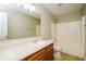 Bathroom featuring a large vanity, full mirror, bathtub, and shower with wall tile surround at 6756 Wimbledon Dr, Zionsville, IN 46077
