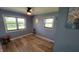 Bedroom with hardwood floors, neutral walls, and natural light at 705 S 450 E, Franklin, IN 46131