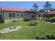 Inviting single-story home with red roof and stone facade, featuring a well-maintained lawn and lovely landscaping at 705 S 450 E, Franklin, IN 46131