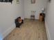Hallway featuring wood floors and neutral walls at 705 S 450 E, Franklin, IN 46131