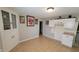 Charming kitchen with tiled flooring, white cabinets, and neutral paint at 705 S 450 E, Franklin, IN 46131