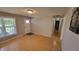 Inviting living room featuring hardwood floors, neutral paint, and ample natural light at 705 S 450 E, Franklin, IN 46131