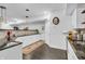 Basement wet bar with white cabinets, granite counters, and stylish backsplash tiling at 720 Willow Pointe North Dr, Plainfield, IN 46168