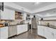 Modern basement bar area with stainless steel appliances, wine storage, and granite countertops at 720 Willow Pointe North Dr, Plainfield, IN 46168